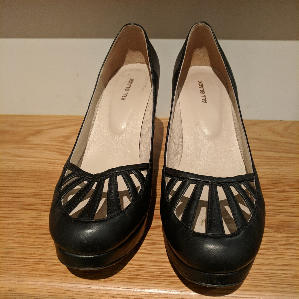 black platform pumps